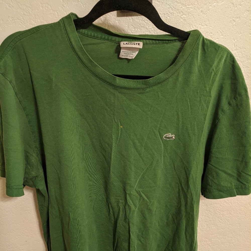 Lacoste tshirt size 6. Damaged